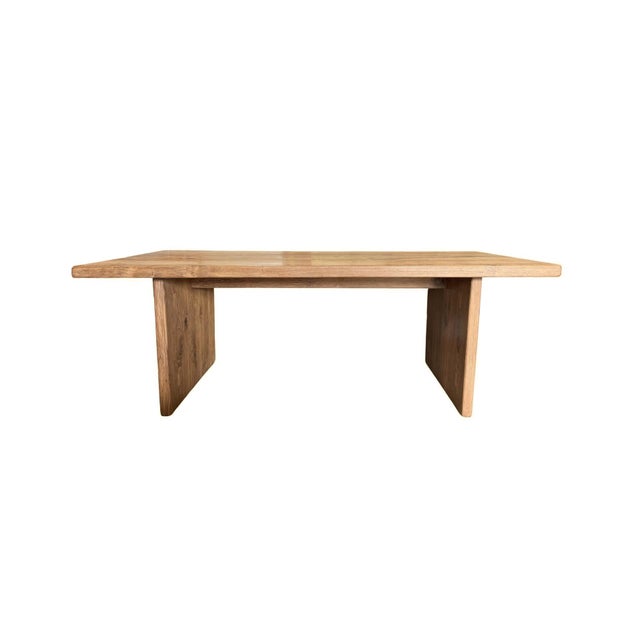 This large solid teak wood dining table is a refined statement of understated elegance and enduring craftsmanship. Defined...