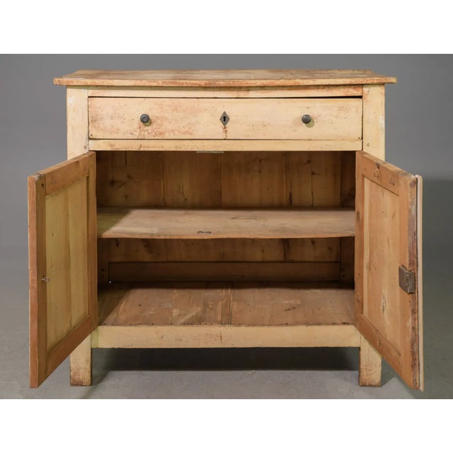 Classic French farmhouse painted two door buffet - early 20th C. This charming rustic buffet has a lovely gold tone...