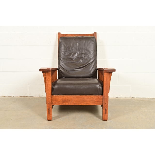 An exceptional Mission or Arts & Crafts spindle reclining Morris lounge chair In the manner L. & J.G. Stickley USA, Late...