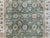 A gorgeous late 20th century Indian Tabriz style rug with an all-over floral trellis pattern with large-scale flowers and...