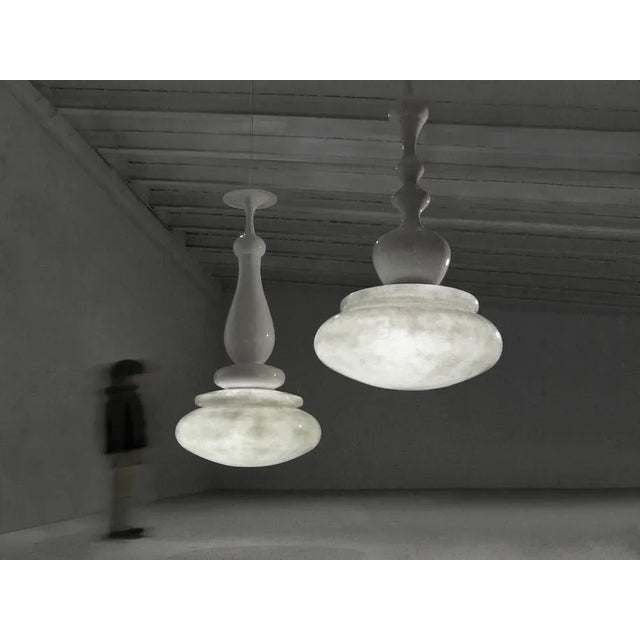 Lucilla lamp by Imperfettolab 2010 Dimensions : Ø 100 x D 195 cm Materials : Fibreglass Modular lamp system. Up to 250V...