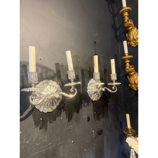 Pair of circa 1900 Caldwell silver plated sconces with two lights