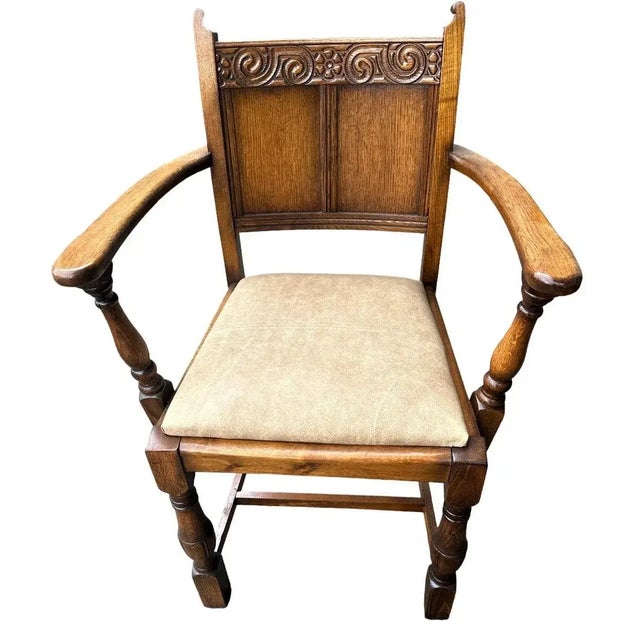 Set of six antique English Arts & Crafts oak dining chairs including two armchairs, circa 1900–1910. Featuring carved...