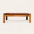 A generously scaled oak coffee table with a distinctive checkered parquet top that turns the natural grain into a graphic...