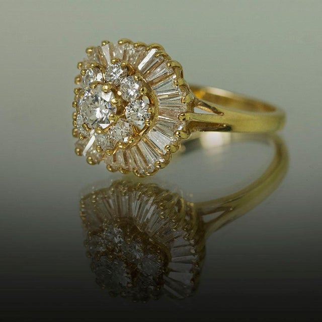 14k Ring with 2.17 carats of round brilliant and baguette shape diamonds. 4.85 grams