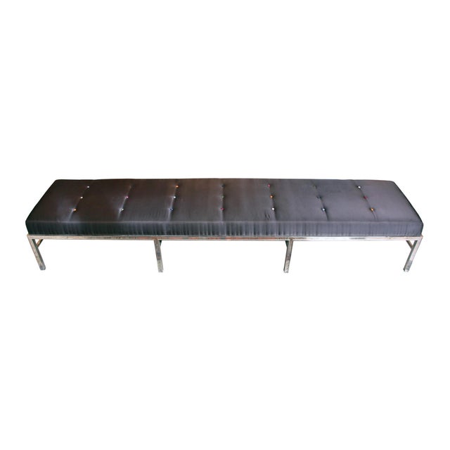 Satin cushioned bench with multicolored silk covered buttons and a nickel over steel base. This is a very heavy and sturdy...