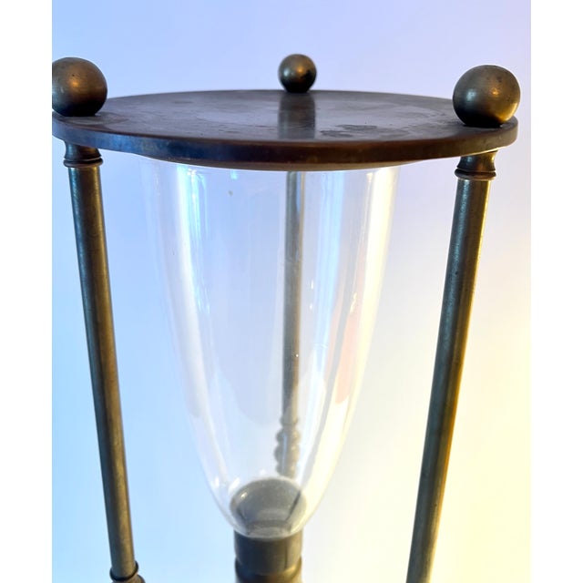 Art Deco Solid Brass and Glass Classic Hour Glass With Sphere Finials and Feet For Sale - Image 3 of 8