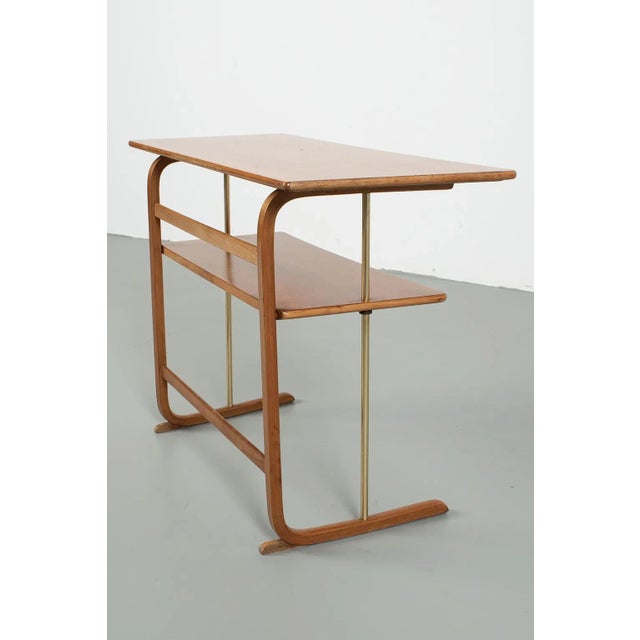 Special 60's vintage console table with brass details. Some traces of use (photos) but furthermore in good vintage...