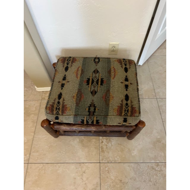 This Old Hickory is a rustic hickory ottoman, featuring a frame made from natural hickory saplings and upholstered with a...