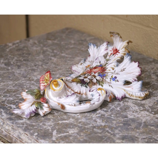 Decorate a powder room, hallway, or garden room with this charming antique French barbotine wall pocket. Crafted in France...