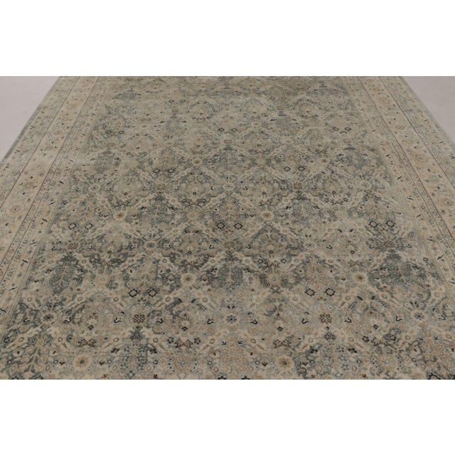 Made with a luxurious blend of hand-knotted wool and silk, this 9x12 contemporary rug is a bold addition to Rug & Kilim’s...