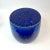A brilliant cobalt blue garden stool will brighten your day! This stool has a large floral designs on the top and sides