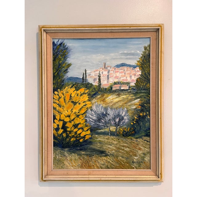 A charming original French oil on canvas depicting a sun-drenched hilltop village in the heart of Provence, signed lower...