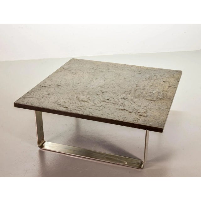 Brutalistic square mid-century design coffee table is made of natural sculptured stone. This ardesia collection slate...