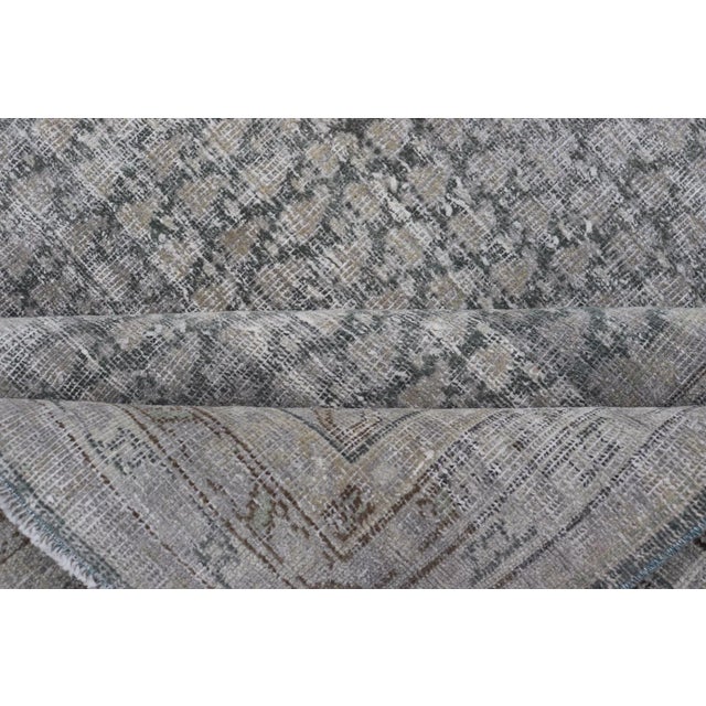 Distressed Persian Antique Tabriz Carpet With Muted Floral Design in Light Gray For Sale - Image 10 of 11
