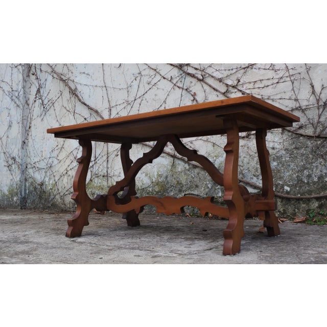 Coffee table in beech stained light walnut with carved base '60s.