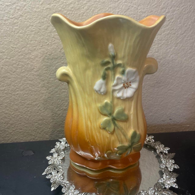 Gorgeous 1930 Weller USA 8” Roba Vase With High Relief Florals The product is a stunning 1930 Weller USA 8" Roba vase with...