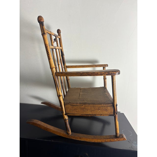 Traditional Vintage Child's Burnt Bamboo Rocking Chair With Spindle Back For Sale - Image 3 of 9