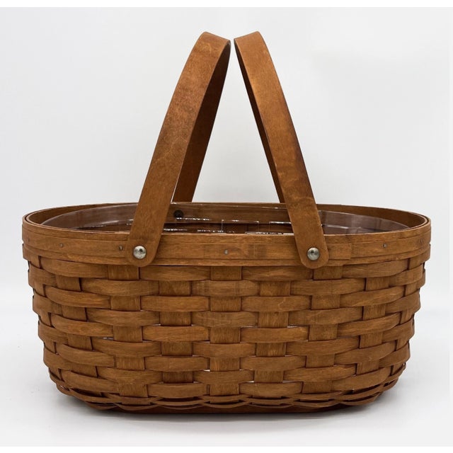 A timeless piece of American craftsmanship, this authentic Longaberger 2008 Oval Market Basket is one of the sought-after...