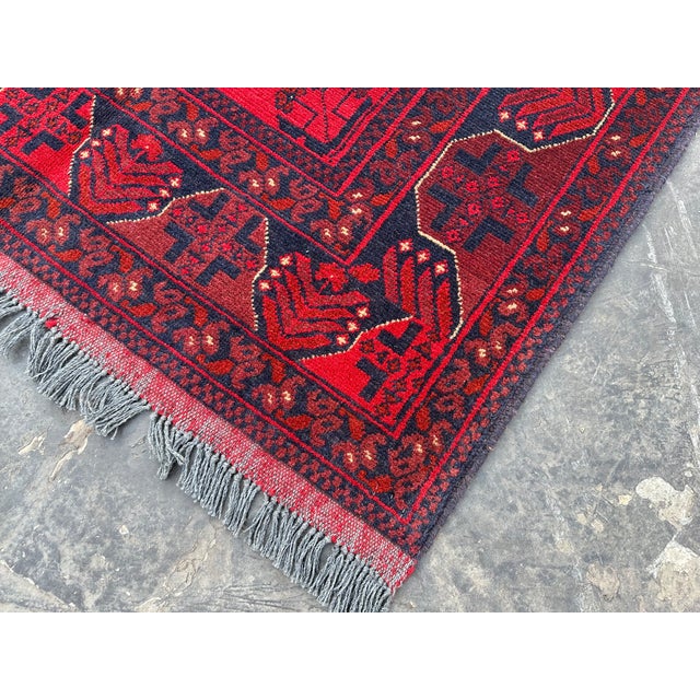 The Afghan Turkoman rug is hand-knotted and 100% wool, This Afghan Turkoman rug will enhance your home's style. This rug...
