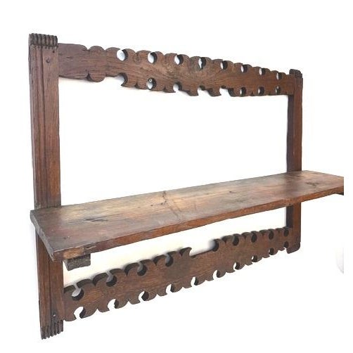 Antique fruitwood decorative wall hung shelf with hand carved cut out design. C late 1800-early 1900. Spanish origin, very...