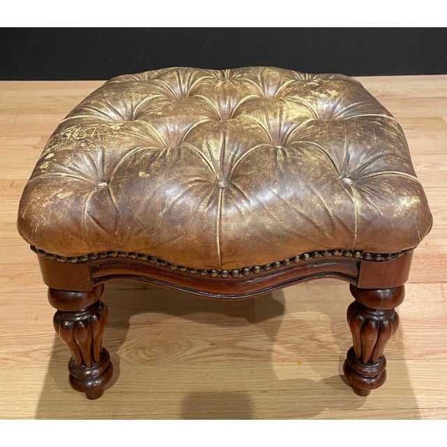 English Victorian leather tufted mahogany footstool/ottoman with turned legs olive green/beige weathered leather.