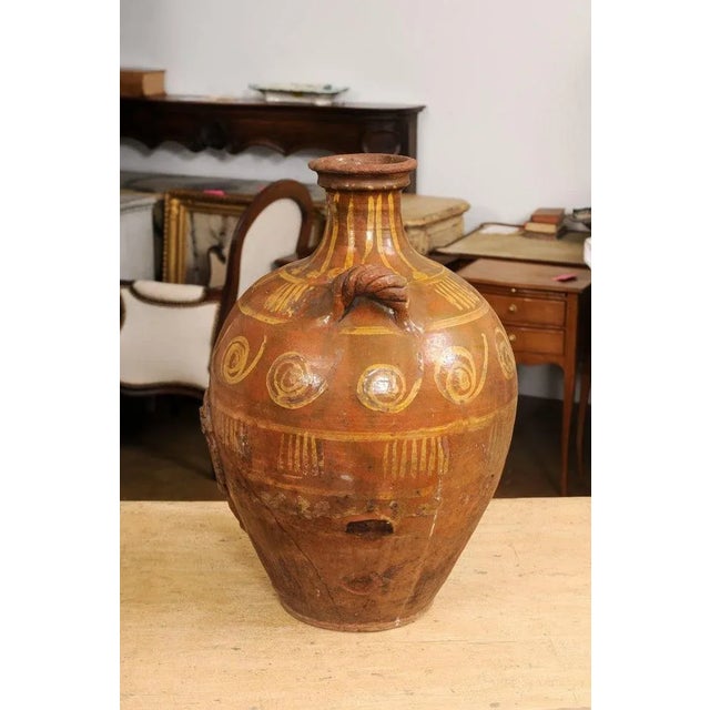 17th Century Italian Terracotta Olive Oil Jar with Yellow Glazed Spiraling Décor For Sale - Image 10 of 13