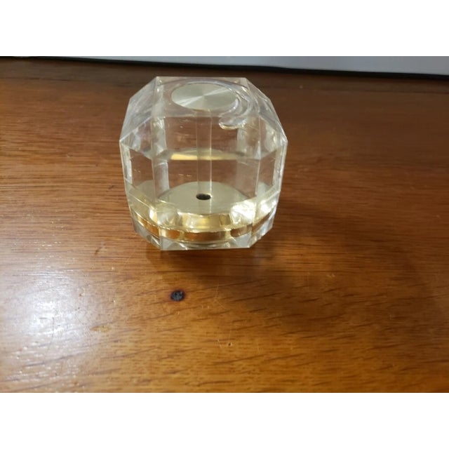It measures 2 1/2" x 2 1/2" x 2 1/2". The piece is in excellent overall condition with minor signs of wear consistent with...