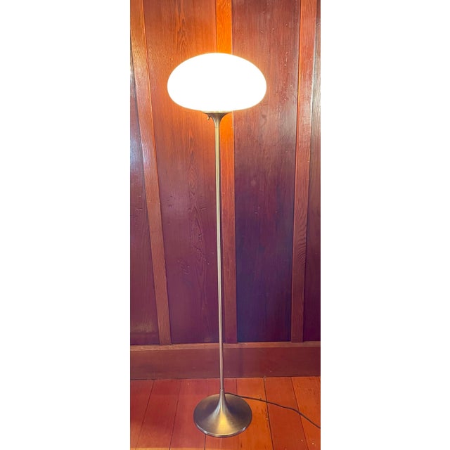 This classic Mid Century “Mushroom” floor lamp with stemmed brushed chrome base features a frosted glass shade. Designed...