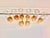 Elegant and versatile set of eight clear glass vessels accented with hand-applied gold leaf. Their slender, contemporary...