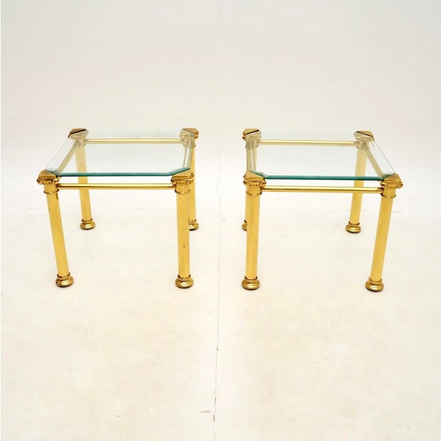 A beautiful pair of vintage French brass side tables with inset removable glass tops. These were made in France, they date...