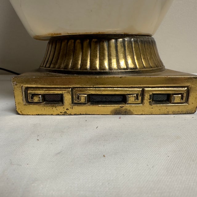 A fabulous 1950’s era Asian Modern ivory ceramic lamp with brown and black striped design standing on a brass base. 24”H...