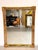 Elegant vintage wall mirror by Deknudt, featuring a richly detailed gilded frame with classic rococo-inspired corner...