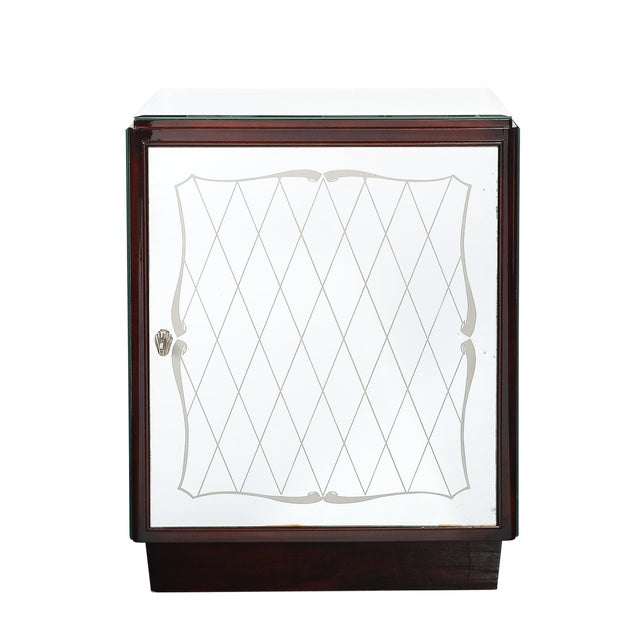 This stunning Art Deco bar cabinet, crafted in France circa 1940, combines the refined elegance of the Directoire style...