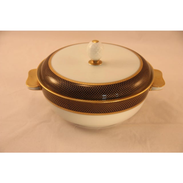 This is a very rare piece, hard to find in blue and gold and I think is discontinued. It's easier to find this bowl in...