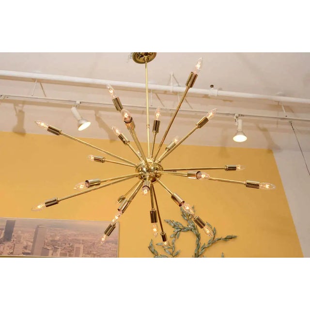 Large scale brass sputnik pendant chandelier by Lightolier. The height listed below is from the bottom of the fixture to...