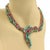 This is a vintage handmade yellow gold necklace, it has leaf engraved emeralds cabochon marquise turquoise with leaf...