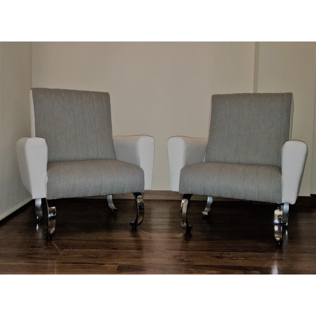 Mid Century Exclusive Pair of Sleek Italian Armchairs with curved metal base Mid Century Modern Exclusive Pair of Sleek...