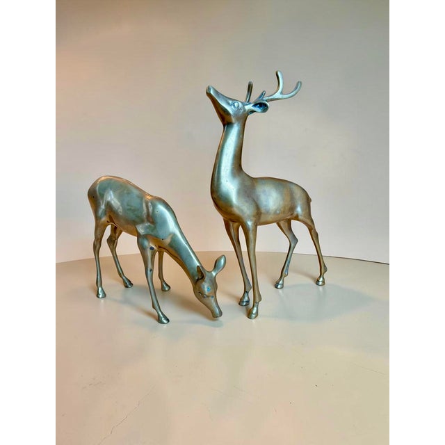 These are large sized vintage brass deer figurines, a buck and doe pair. Solid brass.Original aged patina. See photos Mid-...