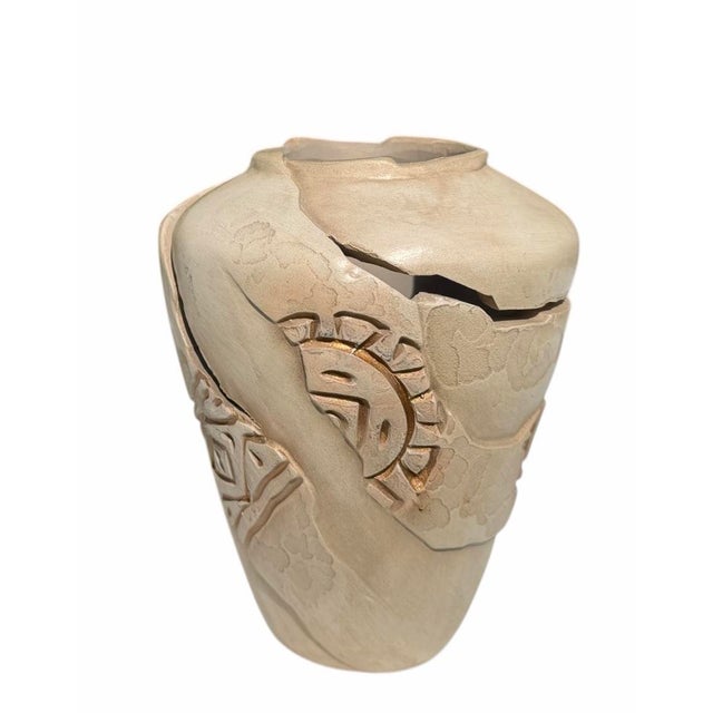 Signed sculptural studio pottery vase featuring an unusual fragmented design with Southwestern-inspired motifs, including...