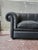 Gorgeous black genuine leather Chesterfield-style sofa. Excellent overall condition with some signs of wear. Goose down...