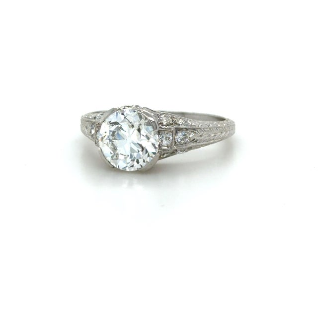 This gorgeous Art Deco Engagement Ring by C.D. Peacock boasts a circular brilliant cut diamond weighing 2.17 carats with I...