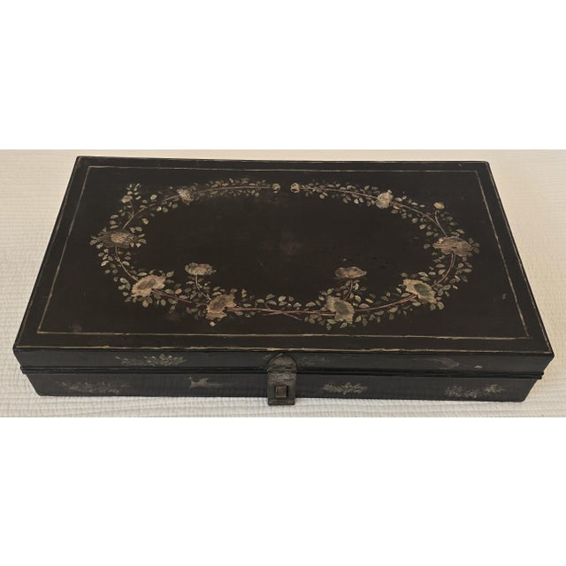 Rectangular antique paper holder box finished in deep black lacquer and decorated throughout with hand-painted floral...