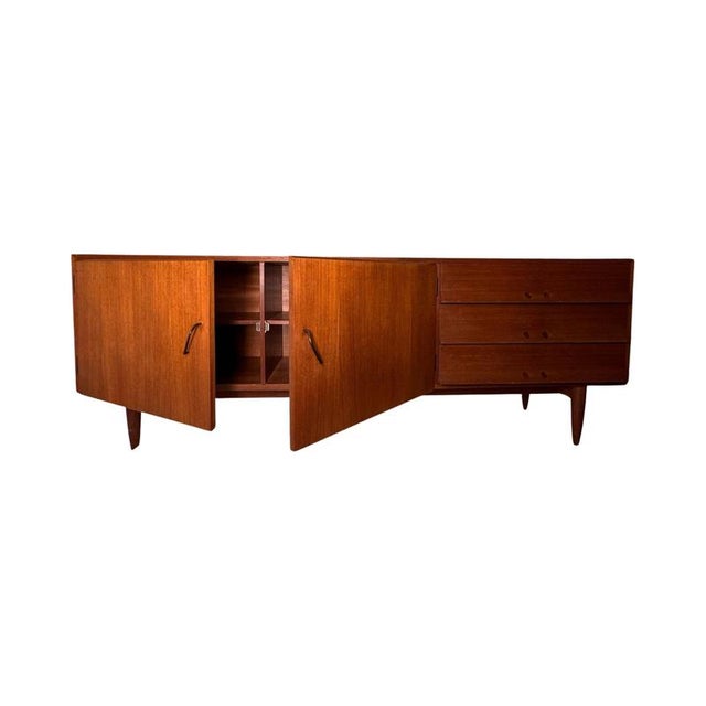 This exquisite German sideboard from the late 1950s-1960s embodies the essence of Scandinavian modernism. Combining...