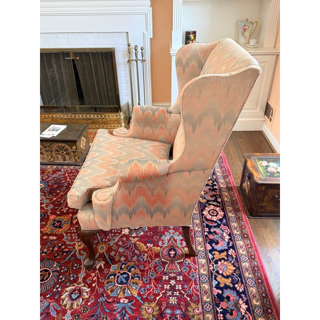 Hickory Chair Wingback Pastel flame upholstery on a classic wingback of exceptional quality. 30” w x 26” d x 42” h Seat 20...