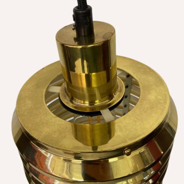 A wonderful brass hanging lamp by Hans Agne Jakobsson for Markaryd, Sweden 1960s. This beautiful design classic has been...