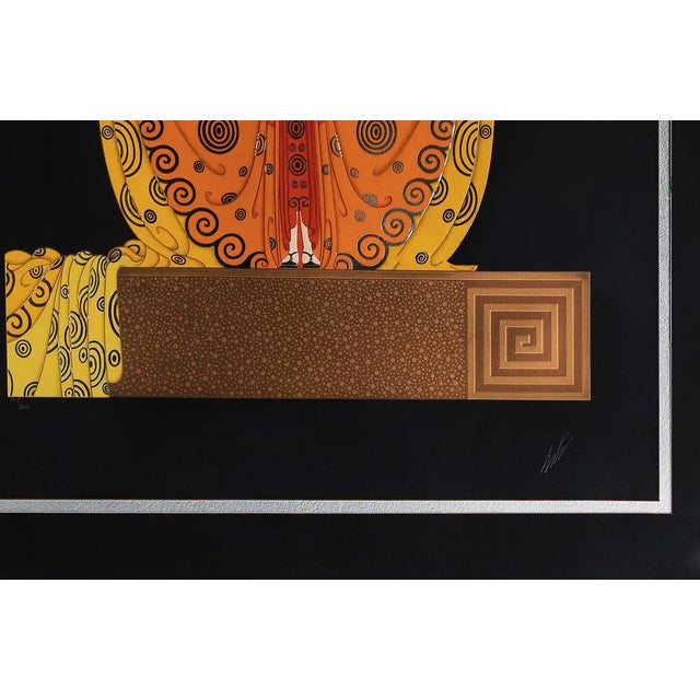Serigraph in colors with foil stamping and embossment on wove paper. Hand signed lower right by Erte. Hand numbered...