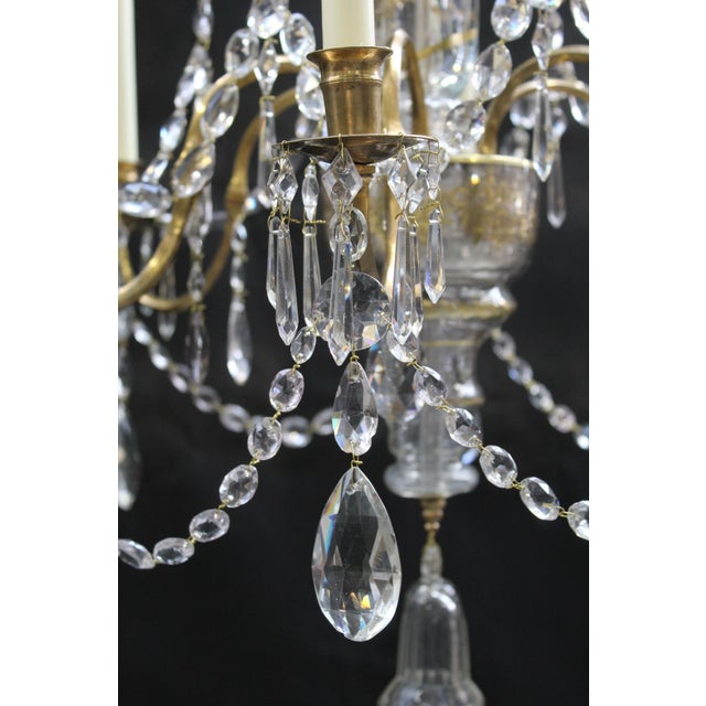 Neoclassical chandelier, late 18th century Elegant neoclassical chandelier with six arms, crafted from gilded bronze and...