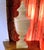 A fine neoclassical alabaster urn from the 19th century or early, carved from a single block of creamy white alabaster...