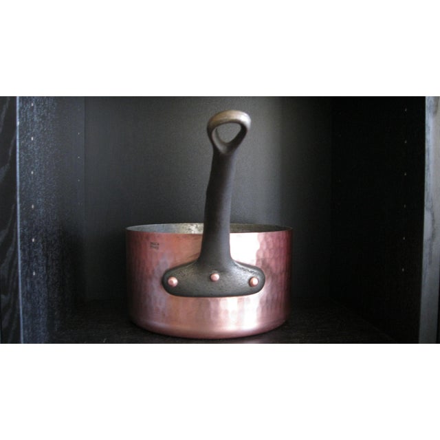 Hammered copper pot w/ iron handle, made in France. Another beautiful gift or, even better, a keeper? Measures; 8" across...
